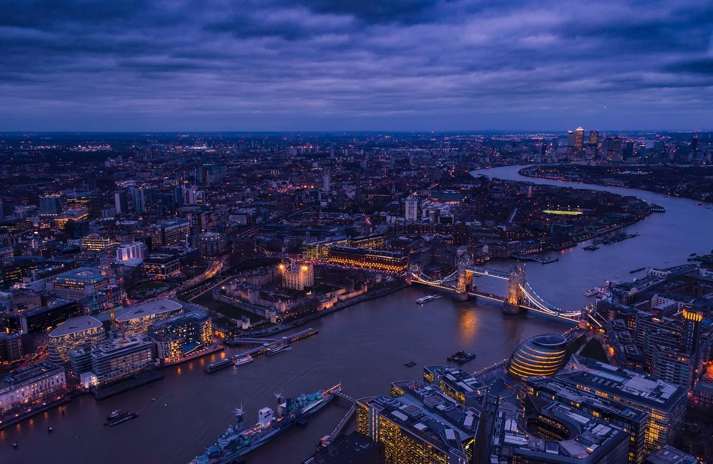 London skyline at dusk with Tower Bridge and the River Thames